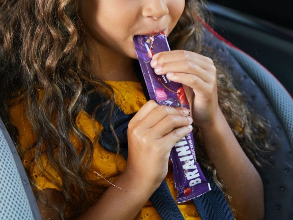 Little Girl Eating Brainiac Kids Yogurt Tubes