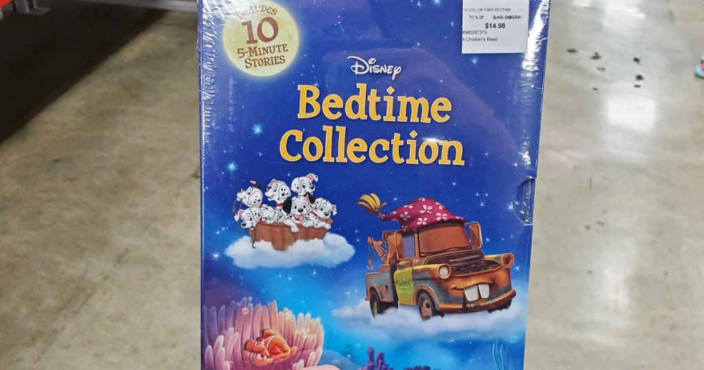 person holding up blue box of disney bedtime collection book set at sam's club