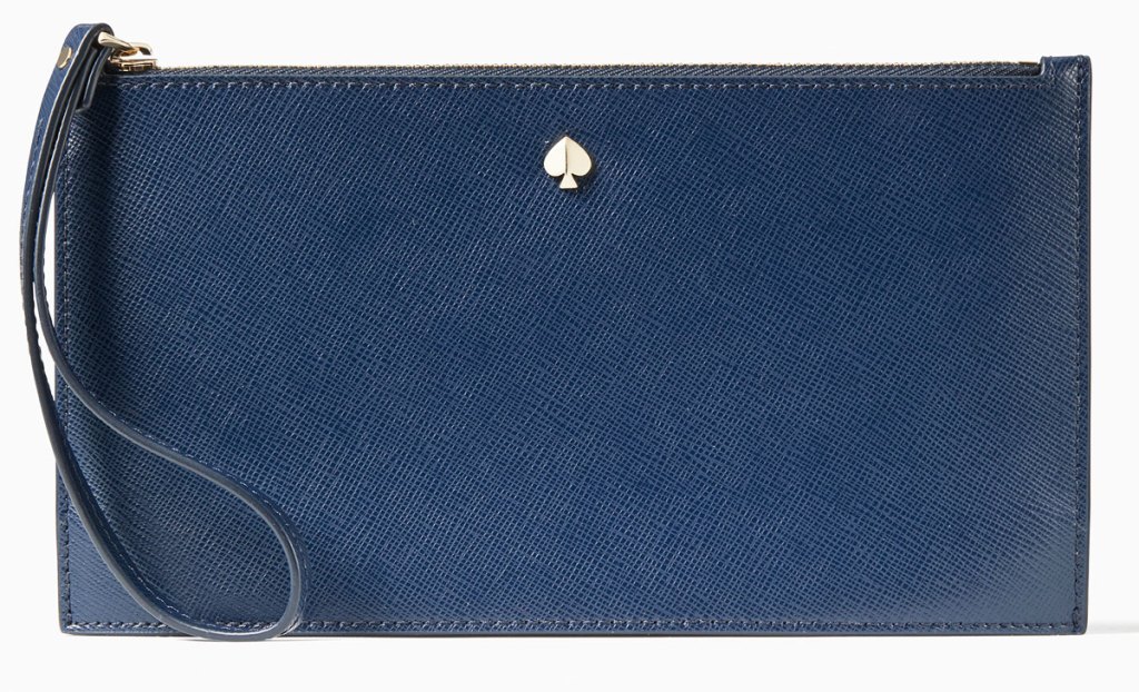 navy blue wristlet with small gold kate spade logo at top center