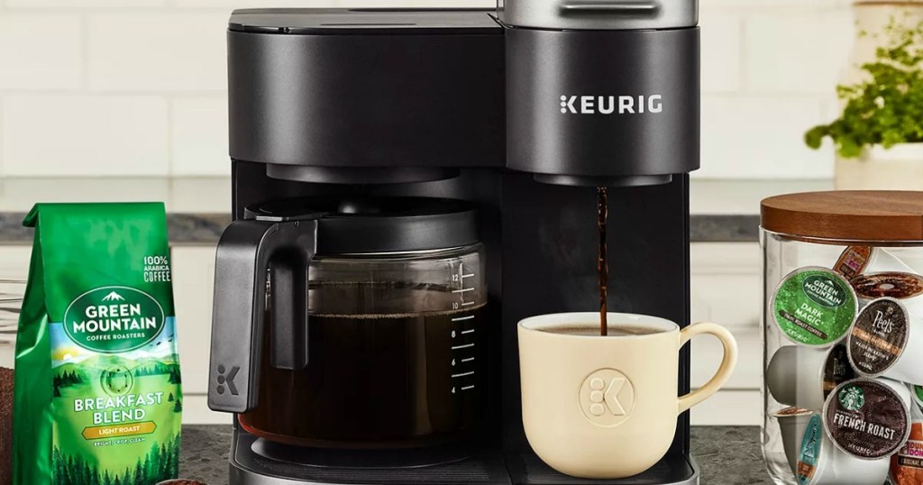 Large kcup coffee maker on counter top near kcup pods