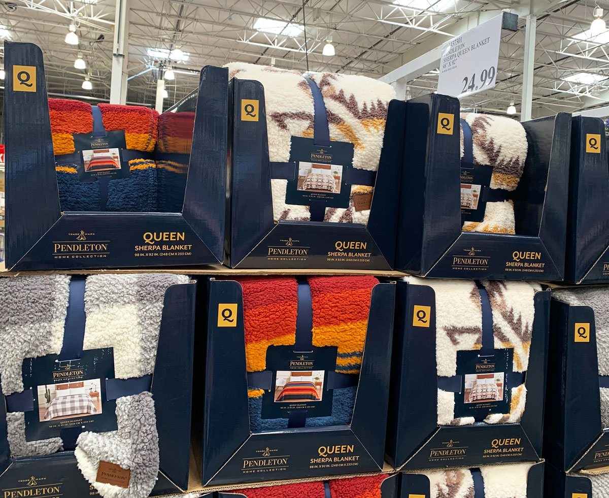 sherpa blankets in cardboard costco display cases