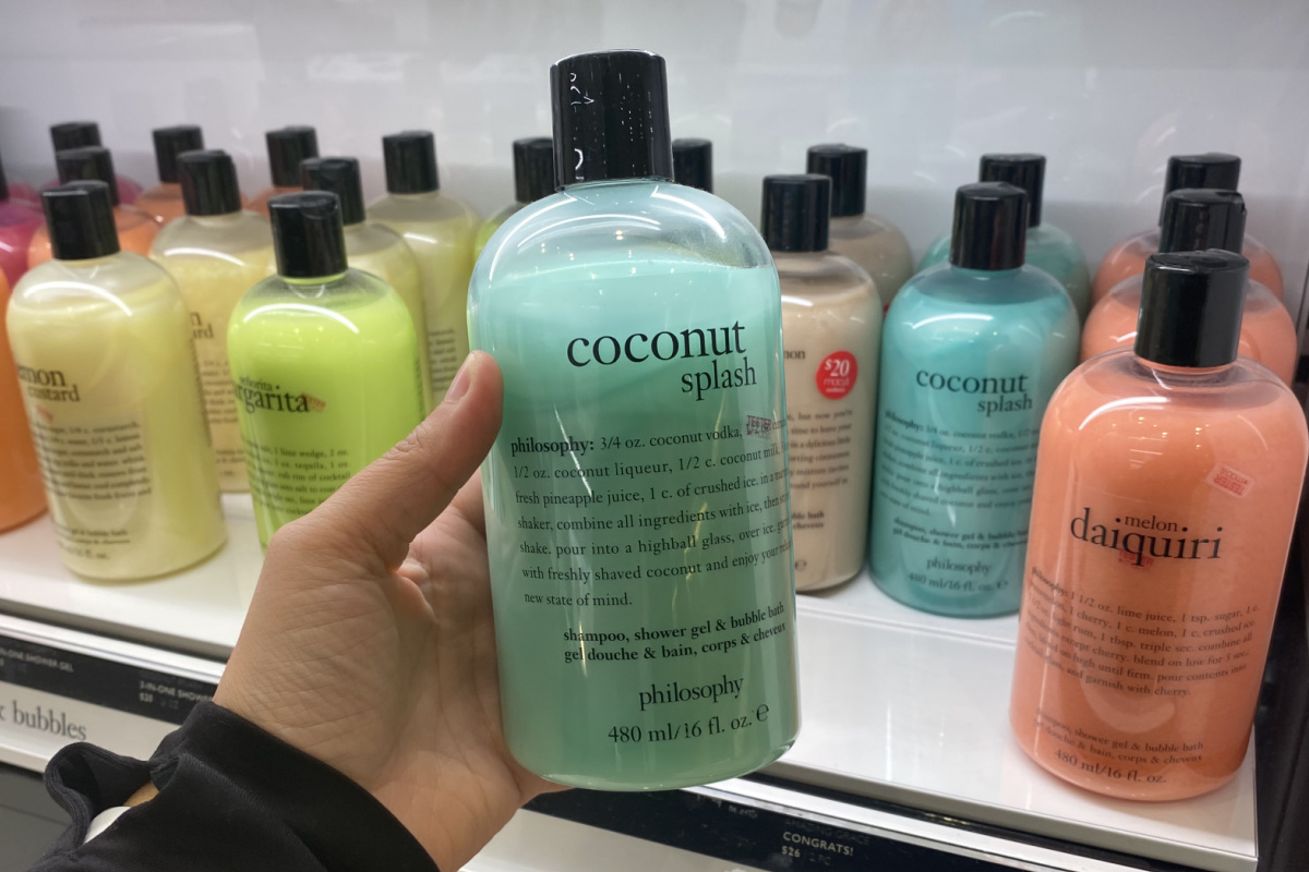 hand holding philosophy shower gel at macys