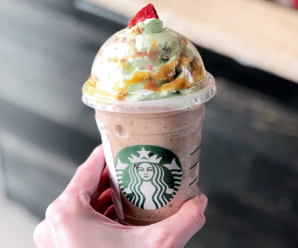 hand holding Starbucks Frapp drink