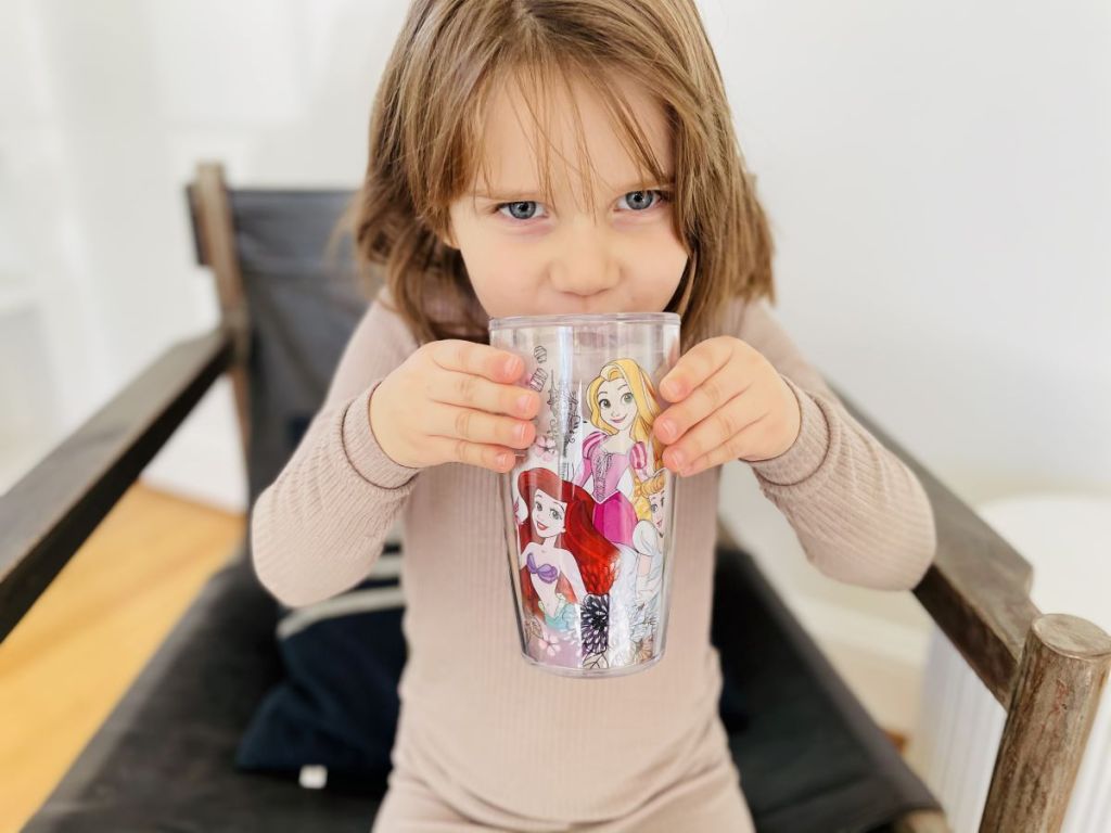 girl drinking out of a Tervis tumbler