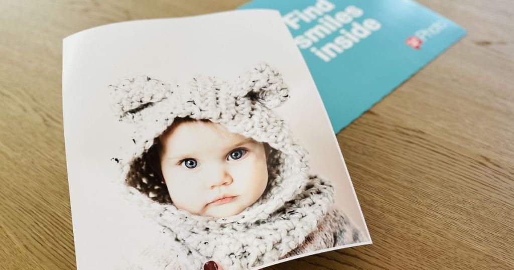 photo of a baby with a bear hoodie