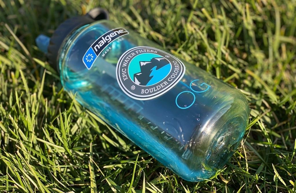 A water bottle in grass