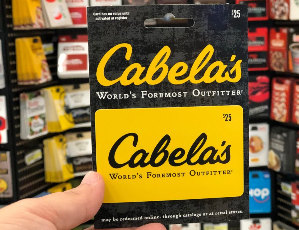 cabelas gift card in hand in store