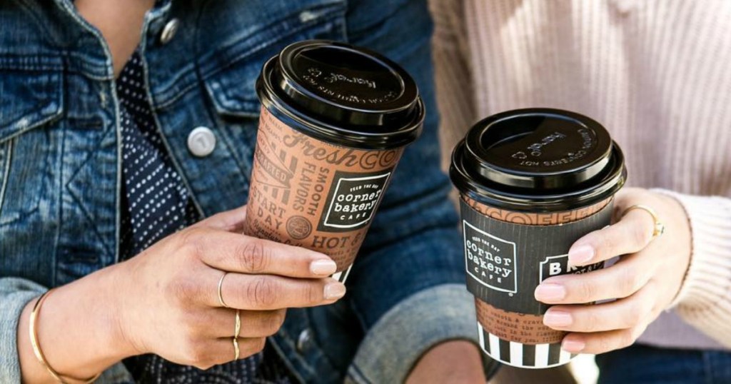 women holding coffee cups