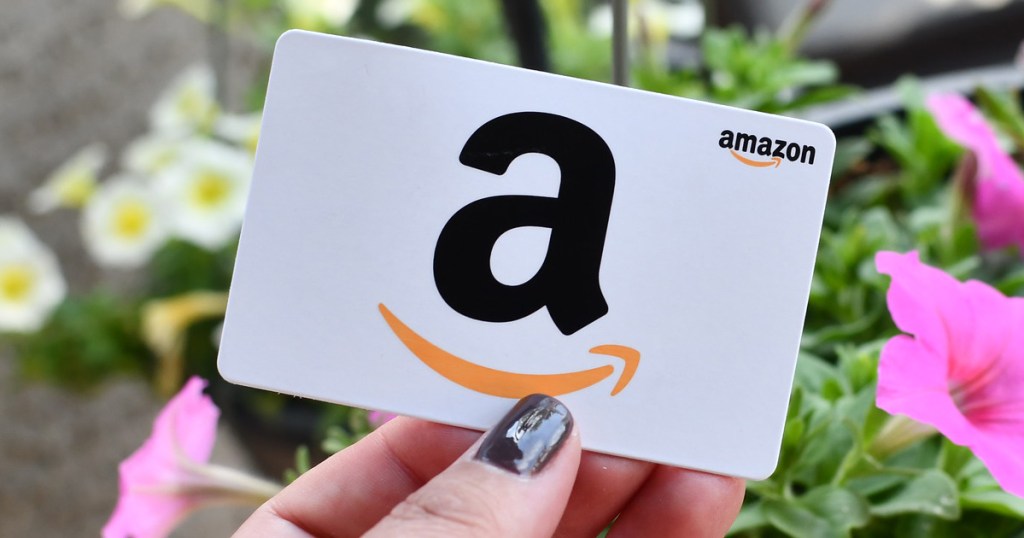 hand holding amazon gift card