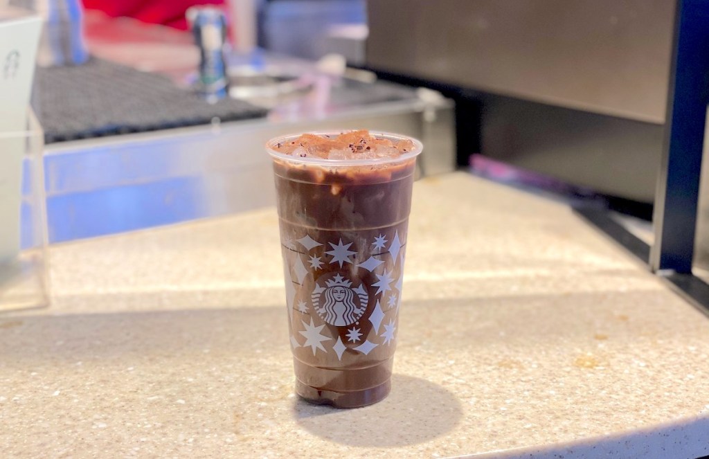 starbucks cup on counter 