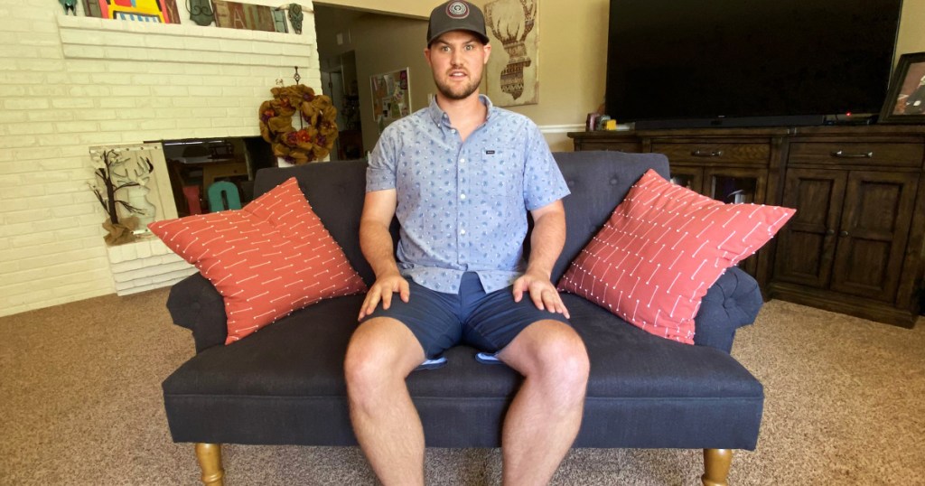 man sitting on couch