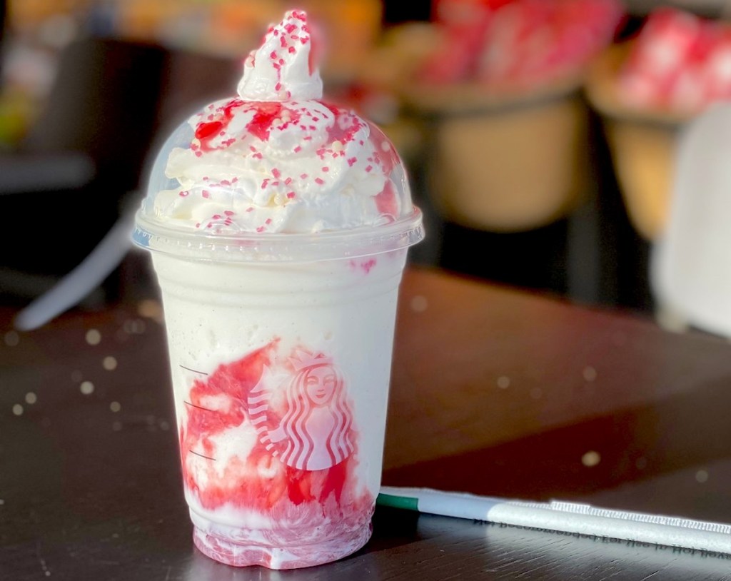 santa claus frappuccino sitting on table