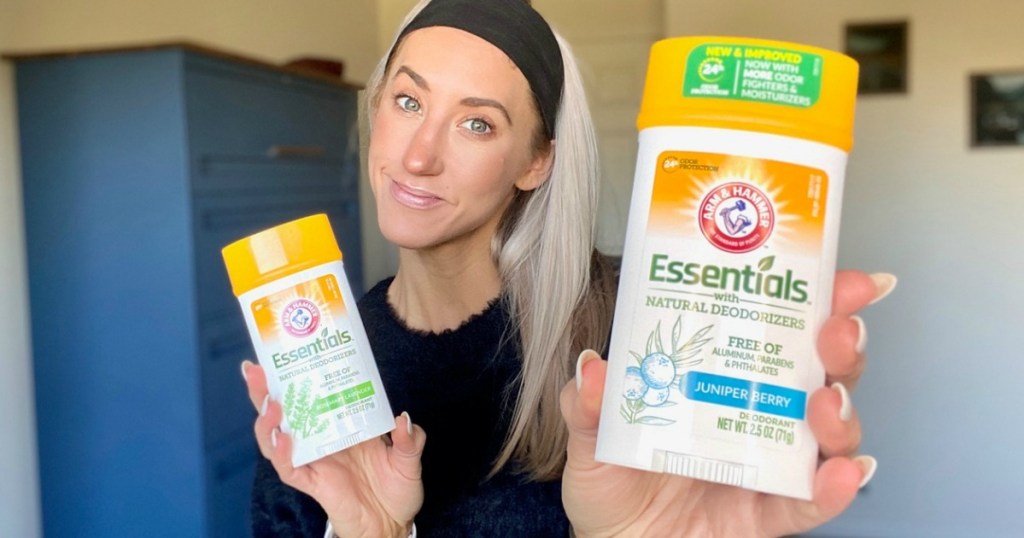 woman holding Arm & Hammer natural deodorants 