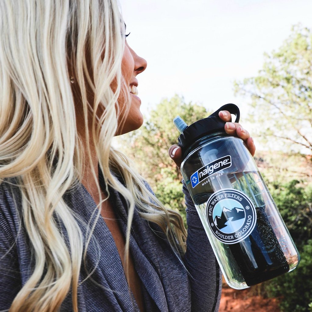 woman holding epic Nalgene water bottle 