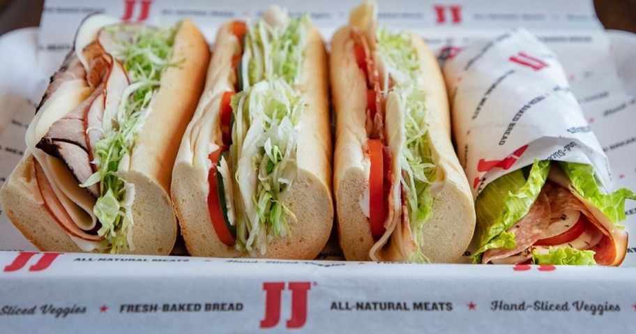 row of subs on a tray