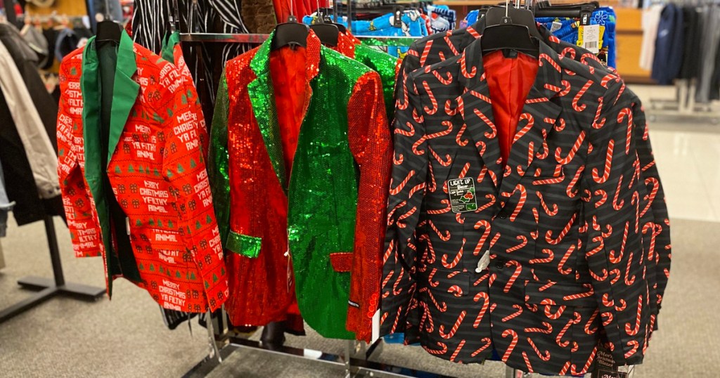 men's christmas blazers hanging on hangers on display at kohl's