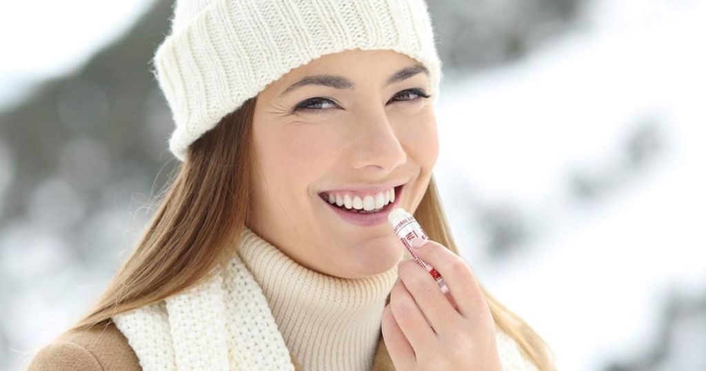 Woman Using Naturisticks Lip Balms