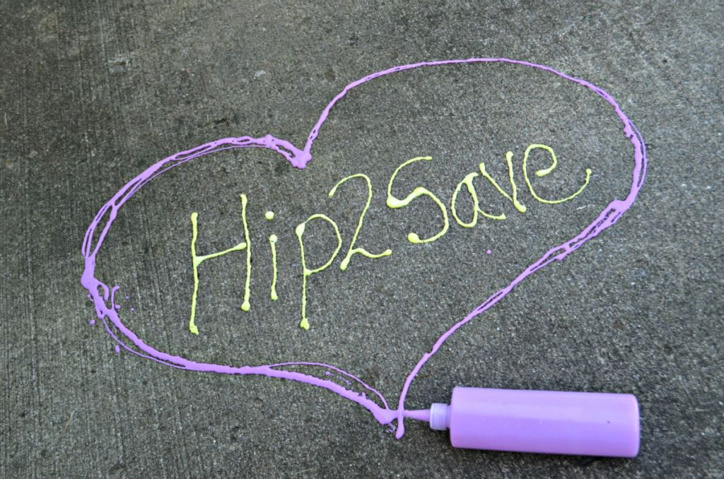 Hip2Save painted on sidewalk inside chalk