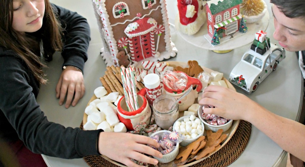 kids eating a hot cocoa charcuterie board