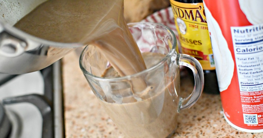 making homemade gingerbread latte on the stove