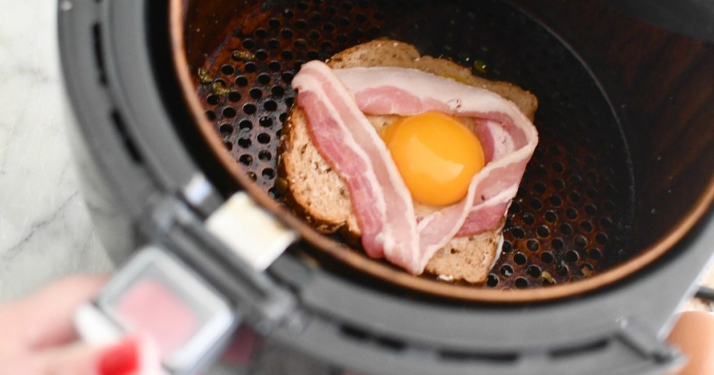 toast with bacon and egg before cooking in air fryer