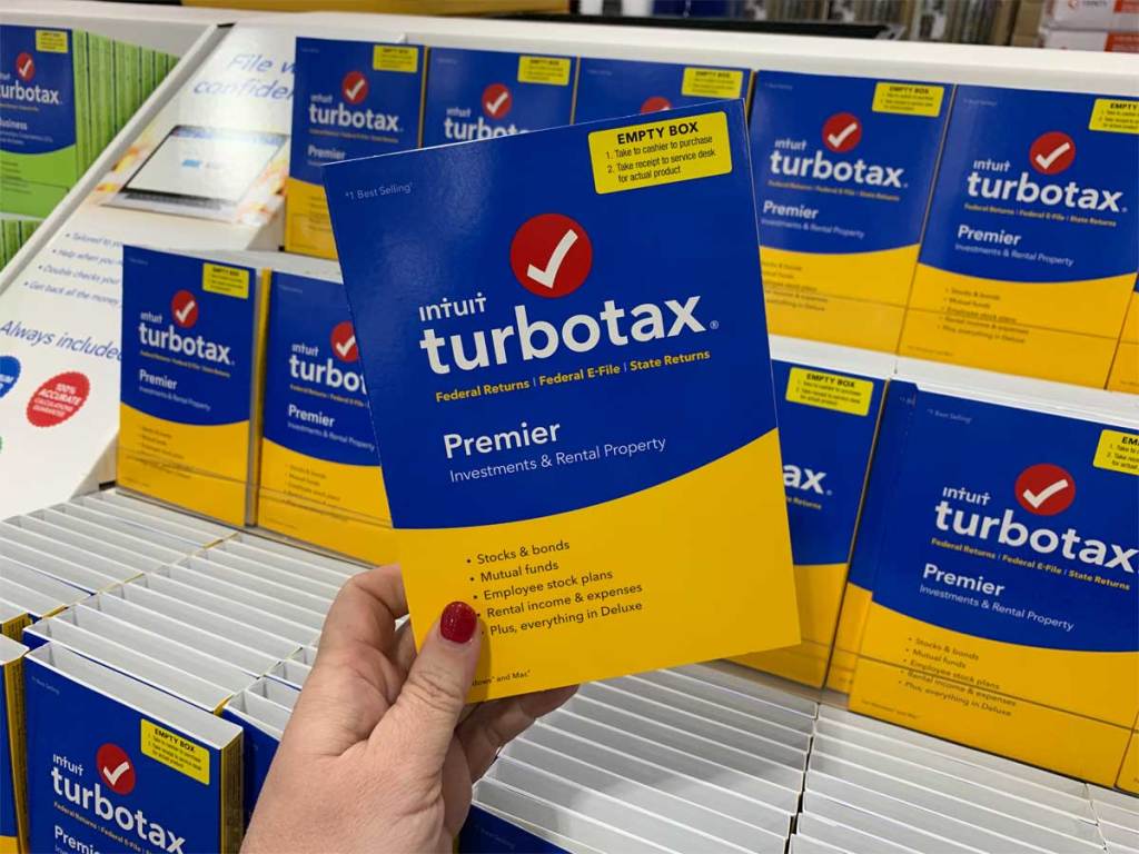 hand holding a turbotax software program in store