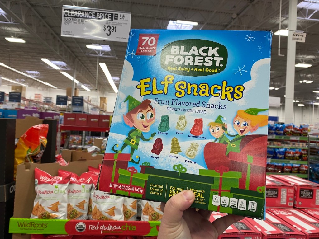 hand holding up Black Forest Elf Snacks in store