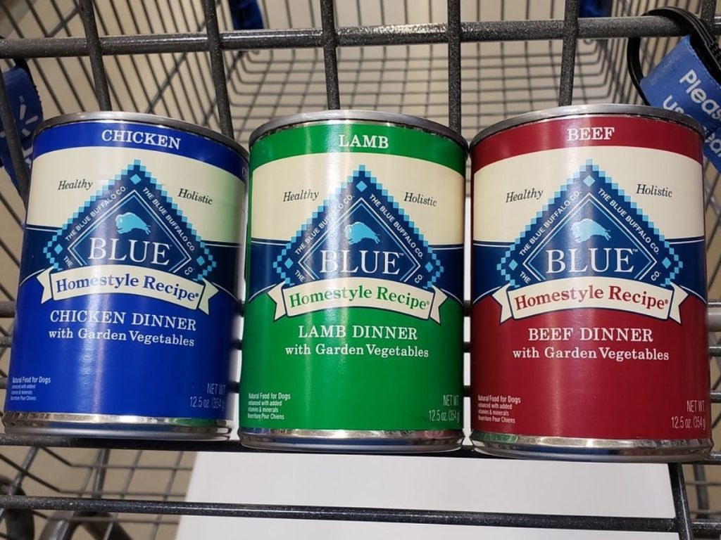 three cans of blue buffalo dog food