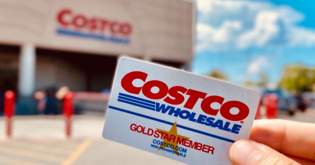 holding Costco card outside warehouse