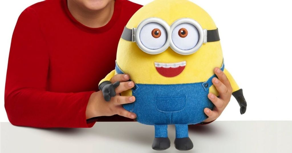 kid holding otto the minion