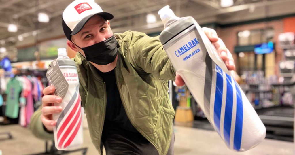 Man holding camelbak water bottles