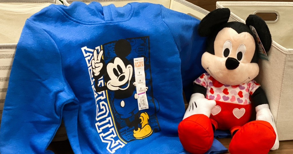 Mickey Sweatshirt next to plush toy