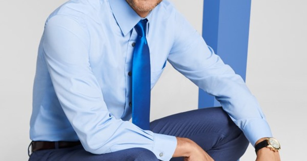 man wearing blue dress shirt