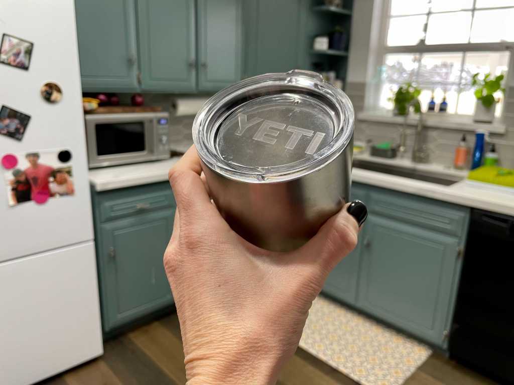 lady holding a Yeti Cup