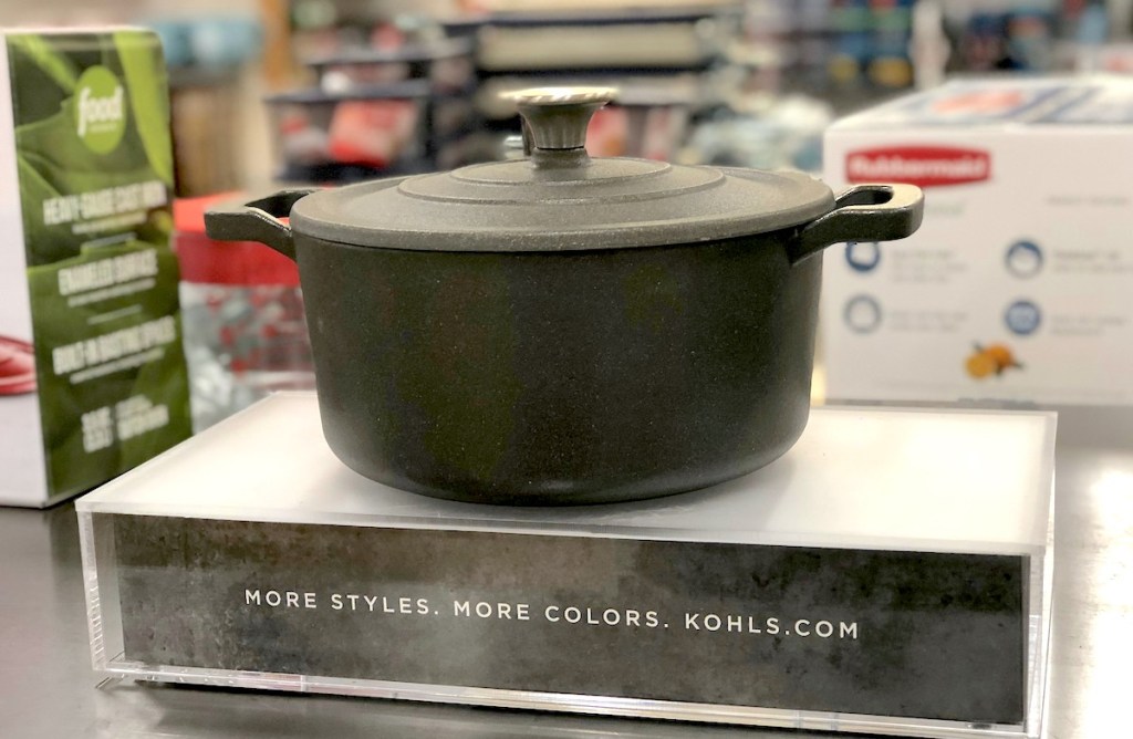 black cast iron dutch oven sitting on store display