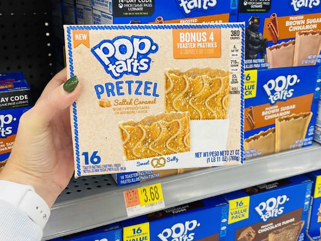 holding a box of Pop Tarts