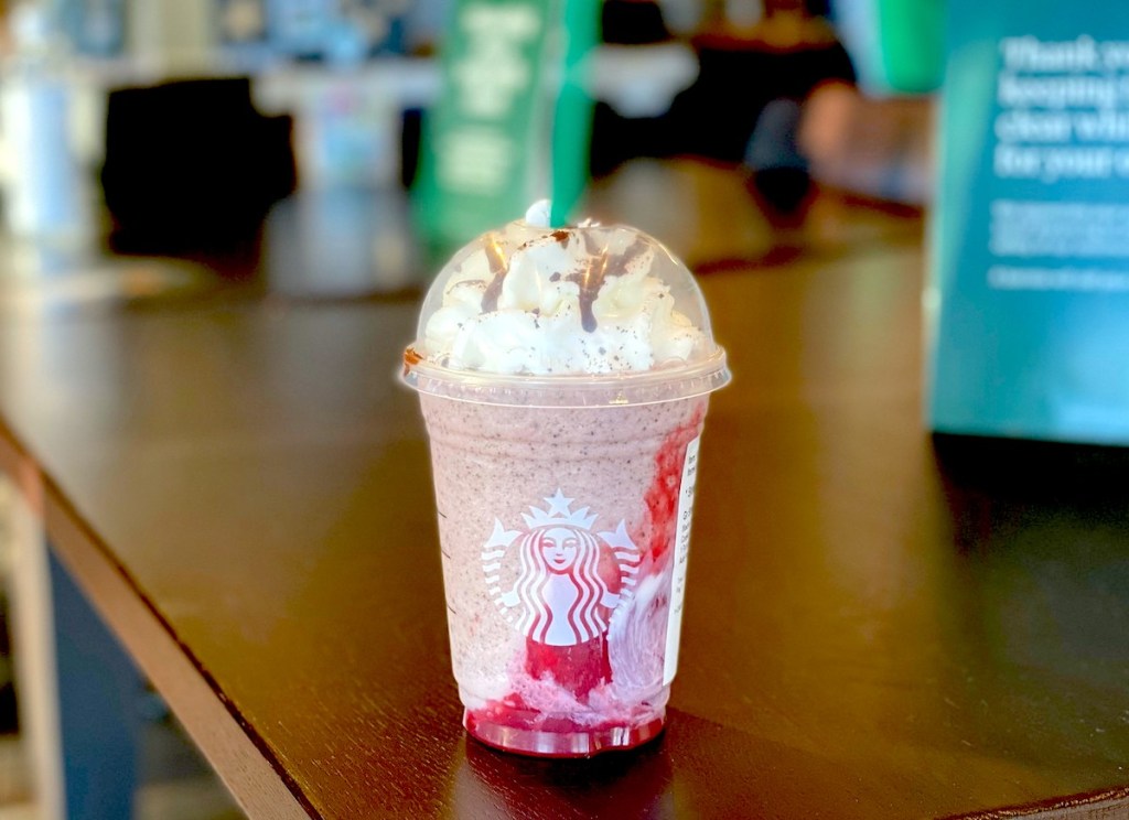 starbucks love bug frappuccino sitting on starbucks countertop