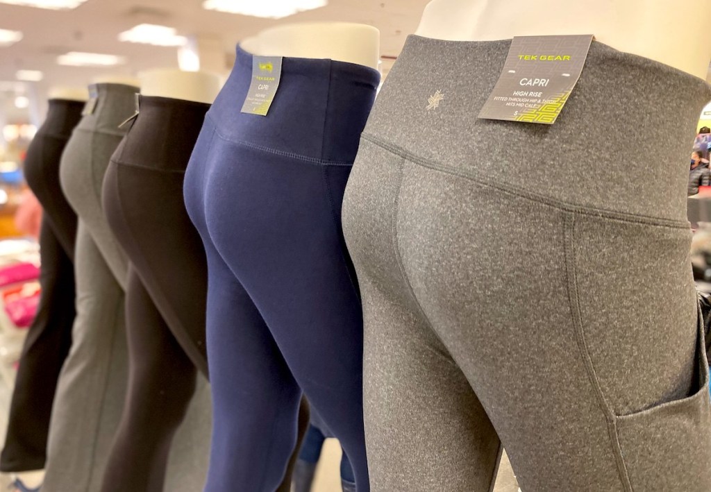 row of workout leggings on mannequins 