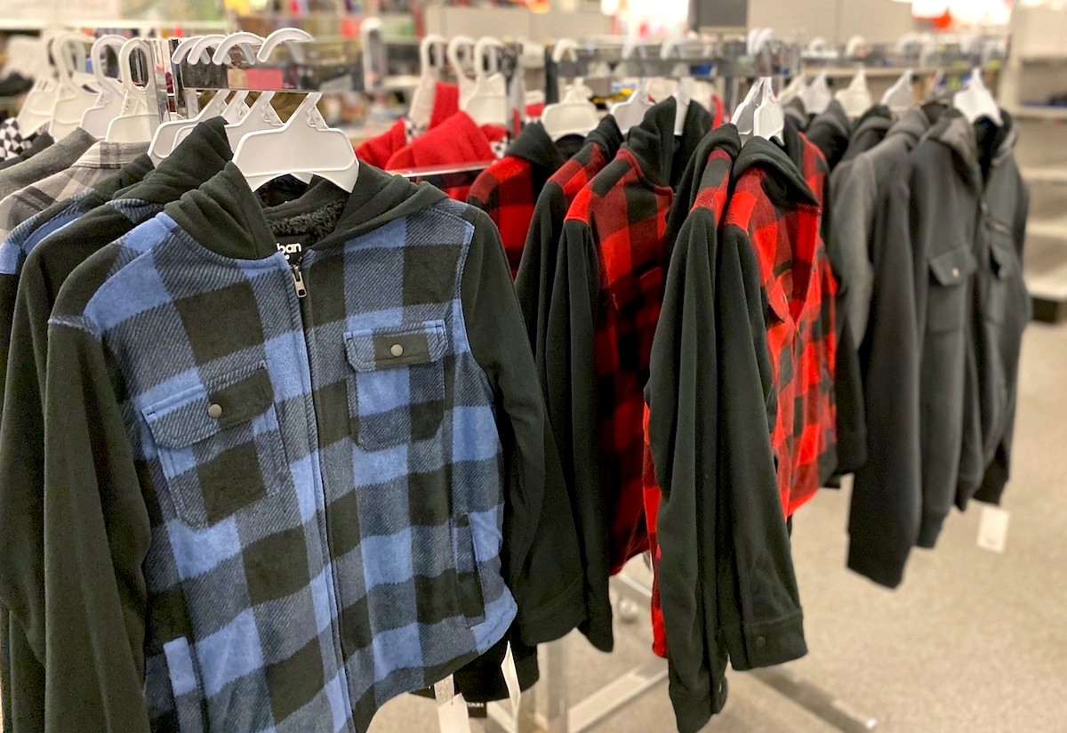 row of plaid and checked flannel zip up jackets