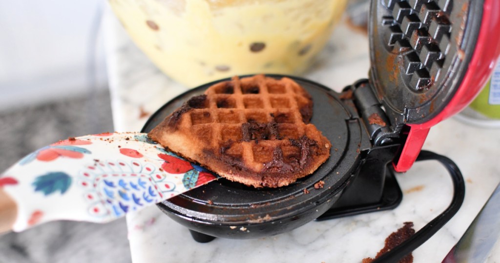 using a spatula to remove waffles