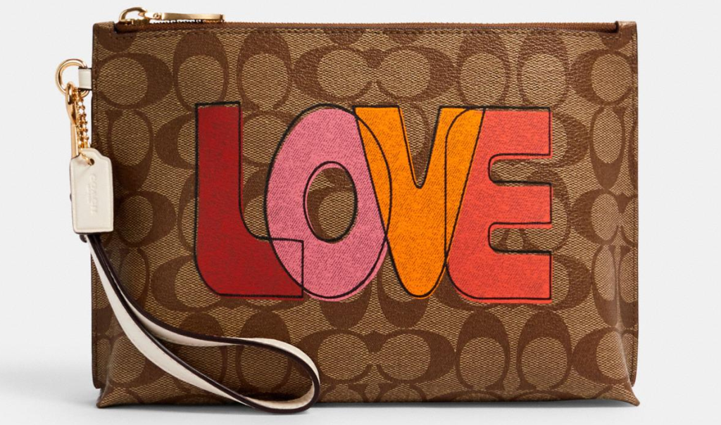 Coach pouch with Love written on it