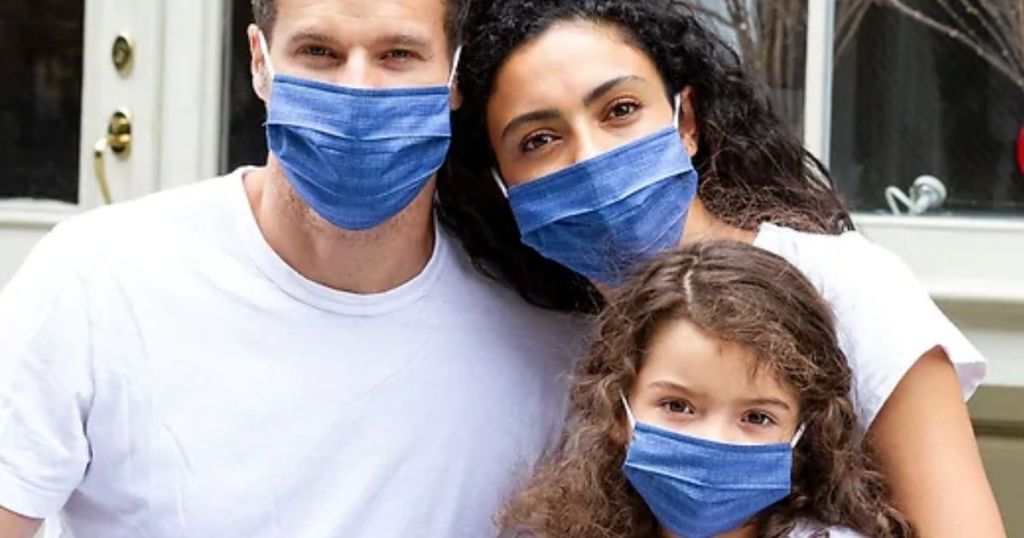 man, lady, child wearing Gap Factory Reusable Family Face Masks