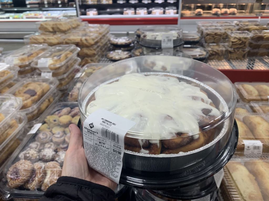 hand holding a Member's Mark CInnamon Rolls Tray