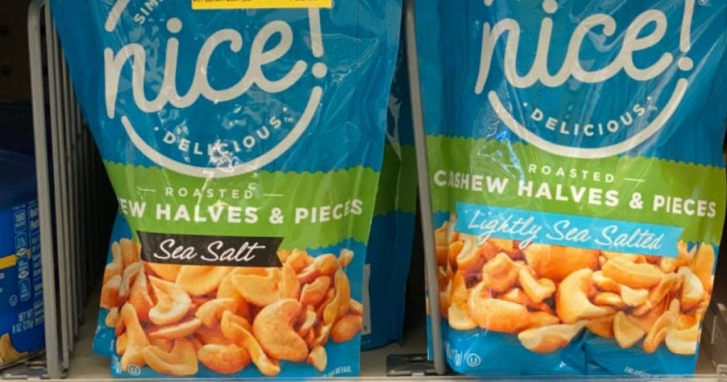 two bags of nice cashews on a shelf