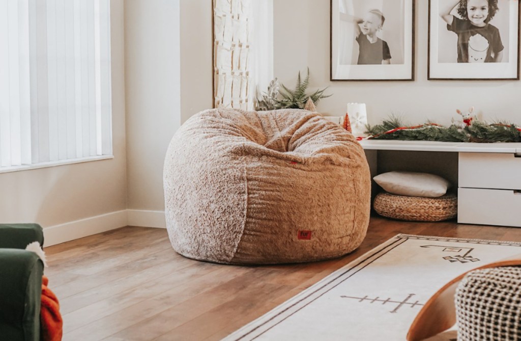 brown bean bag chair sitting on floor