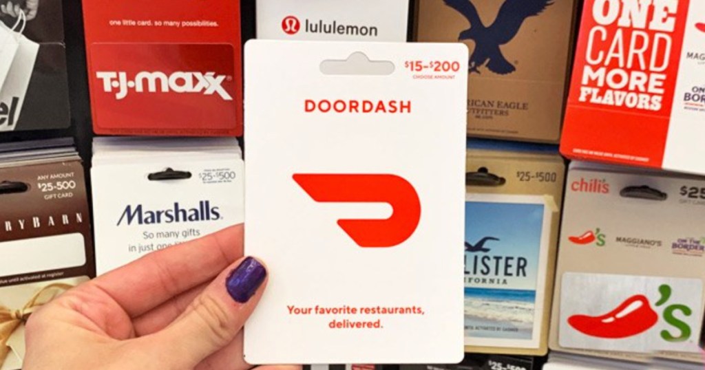 door dash gift card in hand