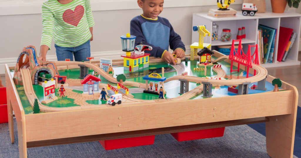 kids playing with kidkraft waterfall table