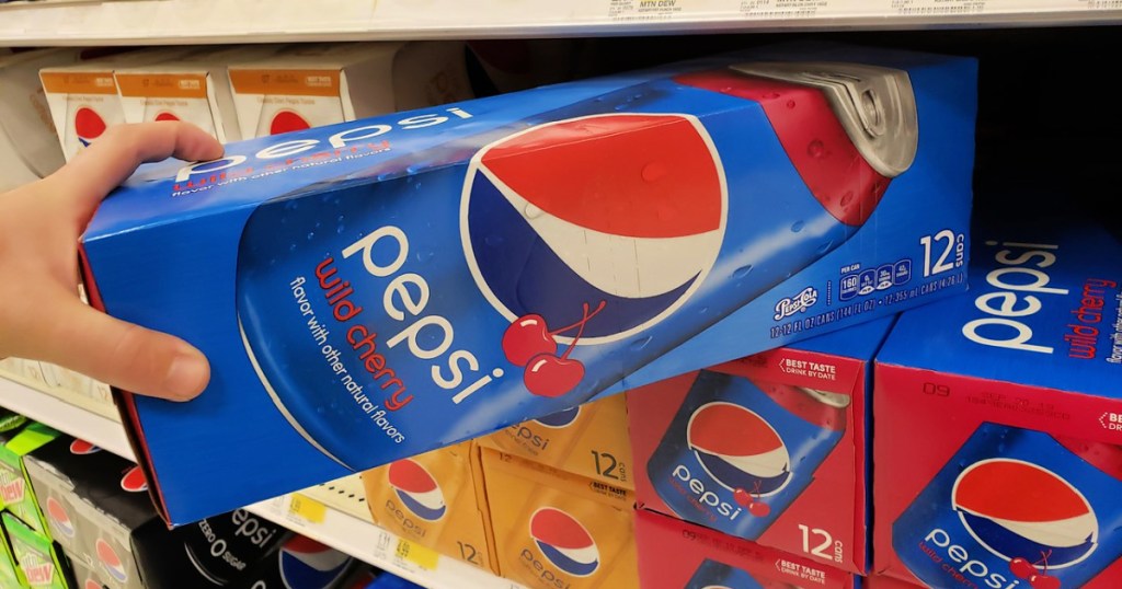 pepsi wild cherry 12-pack in hand at store