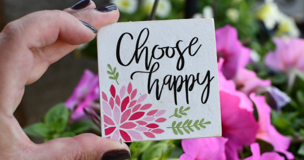 Women's hand holding a DIY magnet