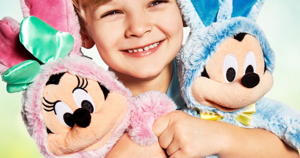 boy holding disney easter plush